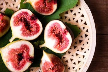 Fresh purple figs in bamboo baskets