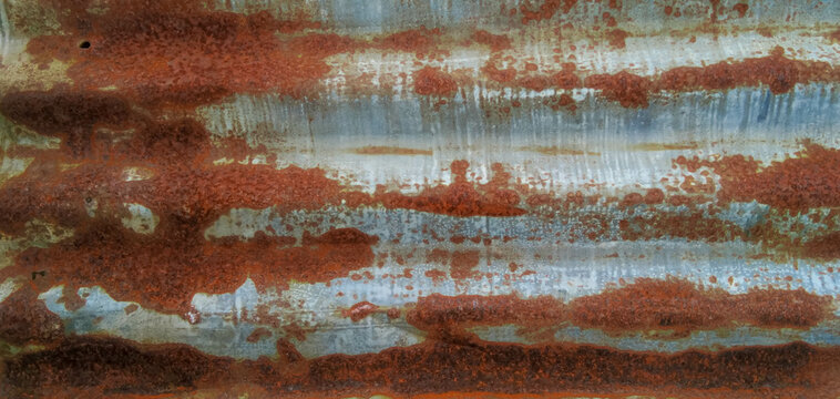 Rusty Iron damaged and corroded by nature and time