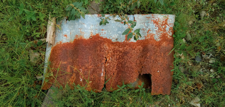 Rusty Iron damaged and corroded by nature and time