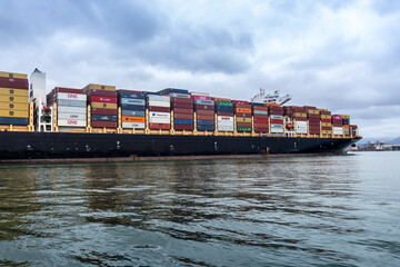 Santos, Sao Paulo, Brazil, September 17, 2021. Cargo ship from Hong Kong loaded with containers is...