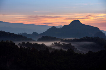 Beautiful aerial view landscape sunbeam with fog at morning, Baan jabo viewpoint. Mae Hong Son, Baan JABO one of the most amazing Mist in Thailand.