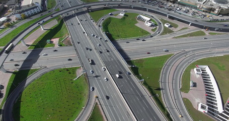 An aerial view of a ring road junction on a sunny day