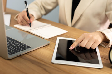 business woman ready for presentation her job with laptop and holding her black note, work from home, partnership, home office, project, quarantine, meeting, presentation, business and finance concept