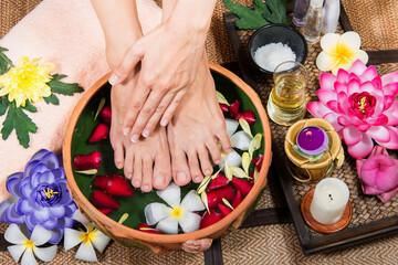 Obraz na płótnie Canvas Spa treatment and product for female feet . Thai Spa Treatments aroma therapy salt . Thailand. Healthy Concept.