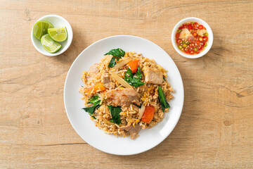 Fried rice with pork on plate