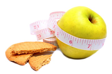 dieting with apple and cookies on white background no people stock image stock photo 