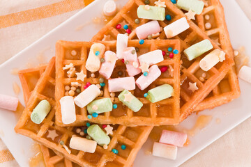 Waffles with colourful marshmallow.