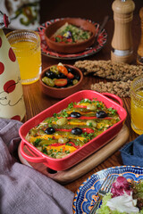 Beautiful and tasty Russian salad on the table of Spanish restaurant