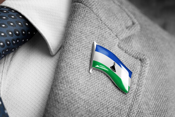 Metal badge with the flag of Lesotho on a suit lapel