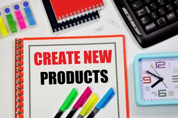 Create new products. An inscription in the goal planning notebook. The creative process of inventing a successful concept and a strategy for its promotion.