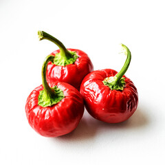 beautiful red mini peppers on a light background