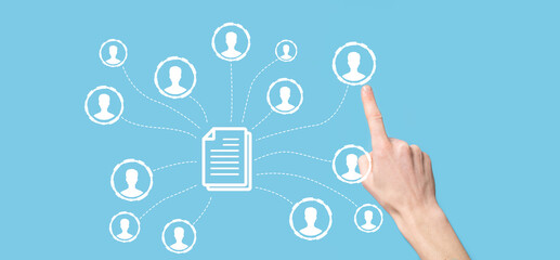Man hold document and user icon.Corporate data management system DMS and document management system concept. Businessman click or publish on document connected with corporate users