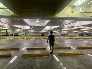 empty parking space man walking