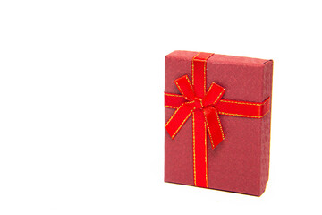 The gift box is red on a white background . New Year and Christmas, birthday. Gift. White background.