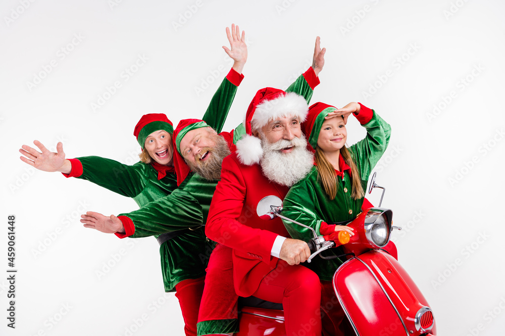 Sticker Portrait of cheerful funky friends riding motor bike having fun looking far december isolated over white color background