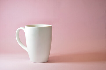 white cup mockup with pink background and shadow 