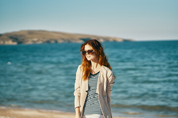 Fototapeta na wymiar woman wearing sunglasses summer nature fresh air ocean travel