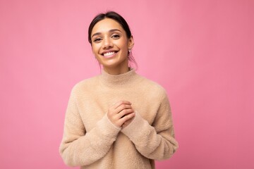 Photo of young positive happy smiling beautiful woman with sincere emotions wearing stylish clothes...
