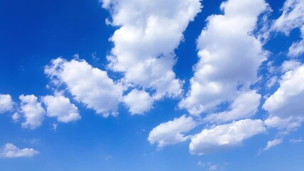 Daytime time-lapse of the beautiful natural landscape with white cumulus clouds rolling in the blue sky