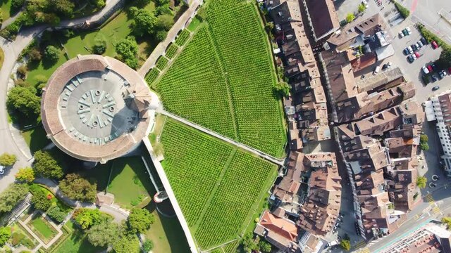 Overhead drone footage of the Munot fortress overlooking the Schaffhausen old town by the Rhine river in Switzerland