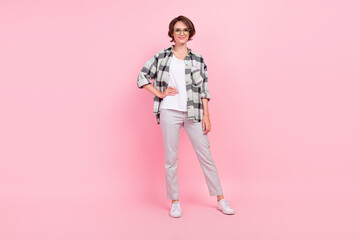 Fototapeta premium Full length photo of young attractive woman happy positive smile cool wear glasses isolated over pink color background