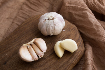 Garlic. chopped garlic, garlic clove, garlic onion on a wooden board.