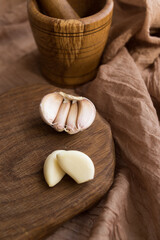 Garlic. chopped garlic, garlic clove, garlic onion on a wooden board.