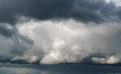 Dark clouds illuminated by the sun
