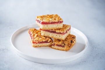 Sweet shortbread cookies with berry jam in a plate