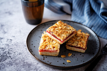 Sweet shortbread cookies with berry jam in a plate