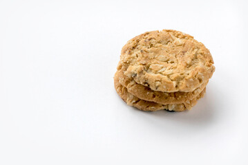 A stack of oat biscuits isolated on white background.