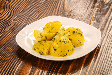 Boiled potato with dill and oil