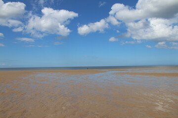 Fototapeta premium beach, sea, sky, sand, water, ocean, landscape, clouds, reflect, reflection, mirror, nature, coast, summer, cloud, horizon, blue, sun, shore, waves, day, coastline, surf, travel, holiday, lake, wave, 