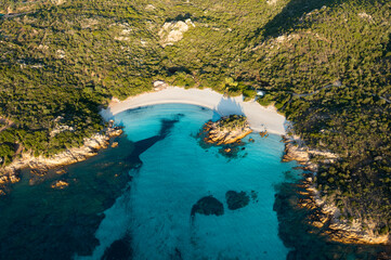 View from above, stunning aerial view of a green coast with the beautiful Prince Beach (Spiaggia...