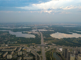 Obraz premium Sunset over Kiev. Cloudy evening. Aerial drone view.