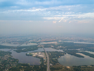 Sunset over Kiev. Cloudy evening. Aerial drone view.