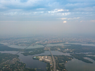 Sunset over Kiev. Cloudy evening. Aerial drone view.