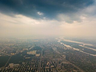 Sunset over Kiev. Cloudy evening. Aerial drone view.