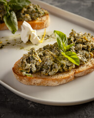 scramble on toast with pesto sauce