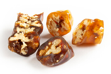 Walnuts on a string dipped in starch grape molasses. Churchkhela. Walnut sujuk.