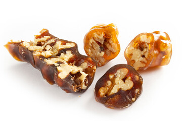 Walnuts on a string dipped in starch grape molasses. Churchkhela. Walnut sujuk.