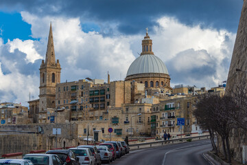 Two famous landmarks in Valletta, Malta, the St. Paul's Pro-Cathedral and Basilica of Our Lady of...
