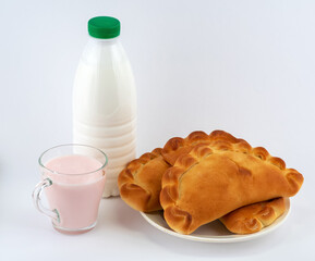 milk with pies on a white background