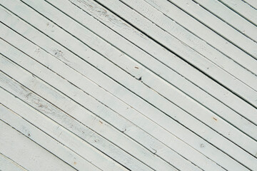 Obraz premium Texture of planks of old wood with peeling white paint