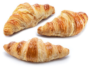 Three croissants on white background. Top view.