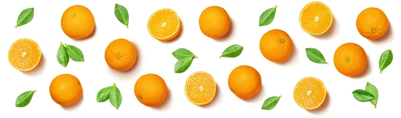 Fotobehang Fruit pattern arranged of oranges and orange leaves on white background. Lay out background. © volff