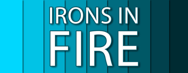 Irons In Fire - text written on blue striped background