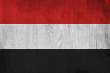 Patriotic wooden background in color of Yemen flag