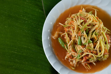 Papaya Salad with Mango Noodles, a popular Thai street food. copy space