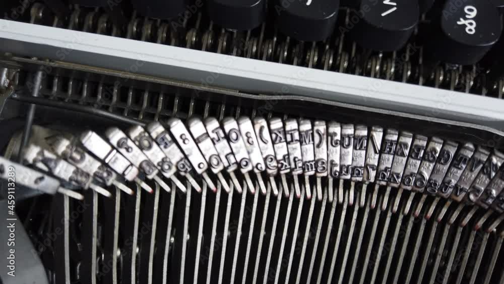 Poster mechanism of a retro typewriter. old typewriter hammers. close up.